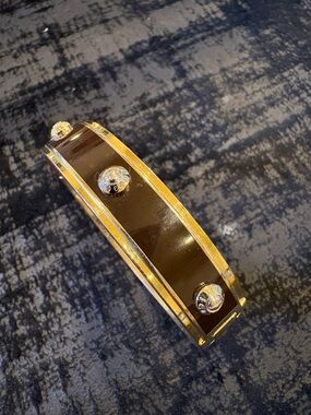 Henri Bendel Bangle Bracelet with Gold-Tone Studs - Brown and gold.